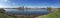 Panorama of lake with pipes of power station on shore