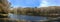 Panorama with lake, sky and trees