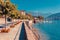 Panorama landscape on beatiful Lake Como in Tremezzina, Lombardy, Italy. Scenic small town with traditional houses and clear blue