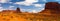Panorama landscape - Iconic peaks of rock formations in the Navajo Park of Monument Valley