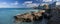 Panorama of landscape of Malta with turquoise clear water, coastline rock cliffs and residential houses