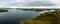 Panorama landscape of Rosmoney Pier and marina and the drumlin islands of Clew Bay