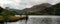 Panorama landscape sunrise over lake in mountains