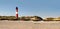 Panorama of a lighthouse at the beach
