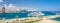 Panorama of Limassol port Cyprus with docked cruise and freight ships, cargo shipping terminal and portal cranes