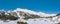 Panorama with lots of snow on Lukmanier in Ticino, on the Swiss Alps. Beautiful landscape, aerial point of view of mountains and