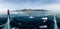 Panorama man stand on cracks on blue ice of Lake Baikal from Olkhon