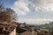 Panorama of the medieval city of Saint Emilion, France with the wineyards in background, during a sunny afternoon