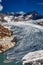 Panorama of melting rhone glacier in swiss alps