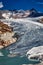 Panorama of melting rhone glacier in swiss alps