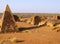 Panorama of Meroe pyramids in the desert at sunset in Sudan