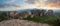Panorama of Meteora monastery, sunset sky clouds and mountain. Travel in Greece
