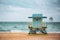 Panorama of Miami Beach, Florida. Miami South Beach lifeguard tower and coastline with cloud and blue sky.