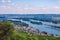 Panorama of the middle Rhine River valley with beautiful vineyards sloping down to a distant medieval village of