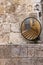 A panorama mirror on a wall in Jerusalem with a reflection