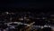 Panorama of modern dark city at night. Stock footage. Top view of beautiful modern city with glowing skyscrapers on dark