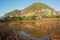 Panorama of mogotes and pond in the Vinales valley