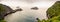 Panorama from Monkey Island in Ha Long Bay with karst stone islands in the sea