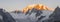 The panorama of Mont Blanc massif and Aiugulles towers in the morning light