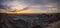 Panorama of Moonscape Overlook and Blue Valley in Utah at sunrise