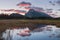 Panorama of Mount Rundle mountain peak with blue sky reflecting in Vermilion Lakes at Banff national park, Alberta Canada. Summer