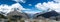 Panorama mountain landscape with snow-capped mountains and valley with turquoise mountain lakes