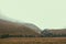 Panorama Mountain pile trees in line  Foggy Carpathian Mountains peaks on a foggy autumn morning. Bucegi Mountains, Romania Europe