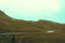 Panorama Mountain pile trees in line  Foggy Carpathian Mountains peaks on a foggy autumn morning. Bucegi Mountains, Romania Europe