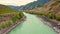 Panorama mountain river from the air. Flying on drone over river in mountains. Shooting the river from above. Flying