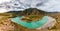 Panorama of mountain river on background of beautiful mountains in cloudy weather. View of turquoise river in the