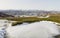 Panorama of Mountainous Snowy Landscape with Village