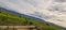 panorama of the mountains with the clouds shrouding