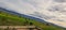 panorama of the mountains with the clouds shrouding