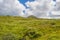 Panorama of mountains, marshy land and heathland of Connemara National Park in summer