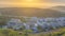 Panorama Mountainside residential area in San Diego, California against the sunset in the sky