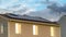 Panorama Multi storey home with solar panel on the roof against cloudy sky