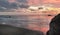 Panorama of Muriwai beach. Sunset under stormy sky