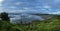 Panorama of Muriwai beach under stormy sky