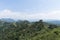 Panorama of Mutianyu section, the Great Wall of China. Mountains and hill ranges surrounded by green trees during summer. Hua