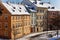 Panorama of Na Kampe Street and square on Kampa Island under Charles Bridge, Prague Venice under snow in sunny winter day, Mala