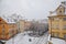 Panorama of Na Kampe Street and square on Kampa Island under Charles Bridge, Prague Venice under snow in winter day, Mala Strana