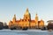 Panorama of the New town hall Rathaus and masch park in winter sunset in Hannover. There is frozen lake