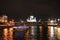 Panorama of the night city with neon lights. Cathedral of Christ the Savior at night