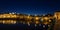 Panorama of the night city of Tavira. Roman bridge.