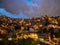 Panorama night cityscape of Juan XXIII neighborhood in San Javier Comuna 13 Medellin Colombia South America