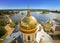 Panorama of the Nilo-Stolobensky monastery in the Tver region on the background of lake Seliger with the dome of the Epiphany Cath