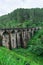 Panorama of the Nine Arched Bridge, located in the deep jungle of Demodara, in cloudy weather, Ella, Sri Lanka