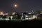Panorama notturno di Benevento con luna piena