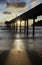 panorama of ocean sunset with concrete jetty