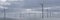 Panorama of an offshore wind farm in the early morning light.